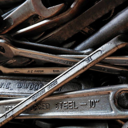ToolsA close-up of dirty wrenches.